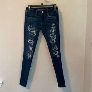 low rise american eagle dark denim ripped jeans